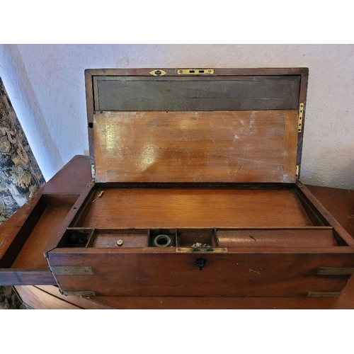 208 - A GOOD VICTORIAN MAHGOANY BRASS BOUND WRITING BOX, with handles to the side, hinged lid opens to rev... 