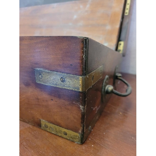 208 - A GOOD VICTORIAN MAHGOANY BRASS BOUND WRITING BOX, with handles to the side, hinged lid opens to rev... 