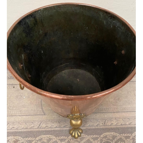 211 - A GEORGIAN COPPER AND BRASS COAL / LOG BUCKET, with lion head rings to the sides of the tapered body... 