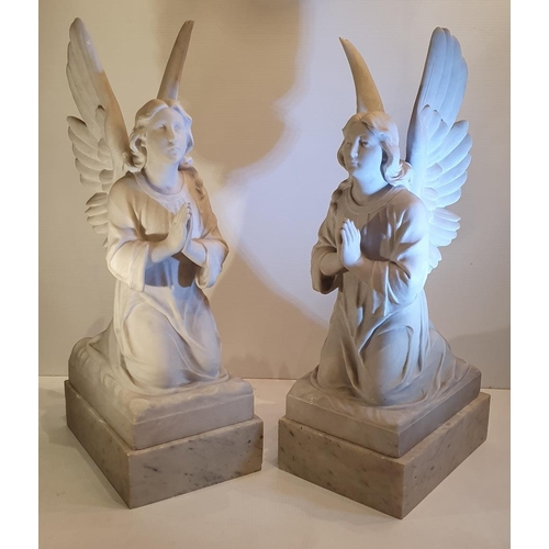 234 - AN EXTREMELY RARE PAIR OF 19TH CENTURY MARBLE STATUES, in the form of kneeling angels, 72.4cm tall x... 