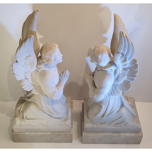 234 - AN EXTREMELY RARE PAIR OF 19TH CENTURY MARBLE STATUES, in the form of kneeling angels, 72.4cm tall x... 