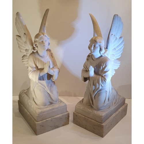 234 - AN EXTREMELY RARE PAIR OF 19TH CENTURY MARBLE STATUES, in the form of kneeling angels, 72.4cm tall x... 