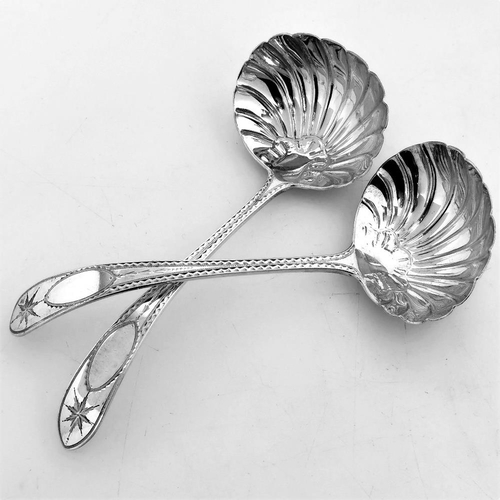 32 - A VERY FINE PAIR OF IRISH SILVER BRIGHT CUT GRAVY / SAUCE LADLES, Dublin, 1902 by John Smythe, each ... 