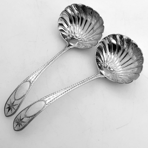 32 - A VERY FINE PAIR OF IRISH SILVER BRIGHT CUT GRAVY / SAUCE LADLES, Dublin, 1902 by John Smythe, each ... 