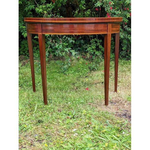 34 - A VERY FINE GEORGIAN MAHOGANY FOLD OVER TEA TABLE, circa 1800, with D shaped top having satinwood st... 