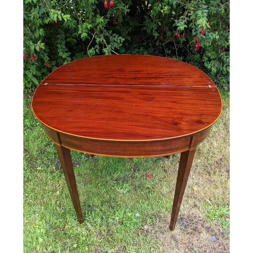 34 - A VERY FINE GEORGIAN MAHOGANY FOLD OVER TEA TABLE, circa 1800, with D shaped top having satinwood st... 