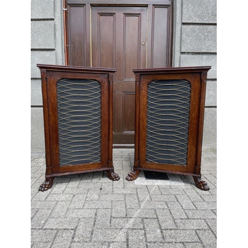 42 - A VERY FINE AND RARE PAIR OF IRISH MAHOGANY FLOOR BOOKCASES / CABINETS, with brass grill doors, rais... 