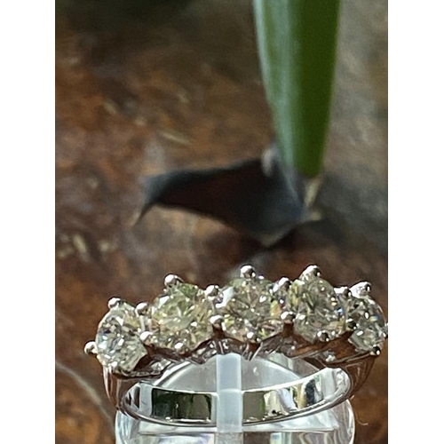 49 - AN 18CT WHITE GOLD FIVE STONE DIAMOND RING, claw set, with a total of 2.55cts of round brilliant cut... 