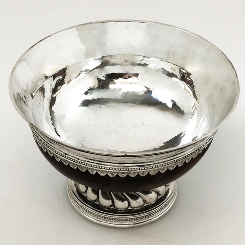 5 - AN EARLY 20TH CENTURY OMAR RAMSDEN MAZER BOWL, with silver mounted on wood, a gentle flaring rim is ... 