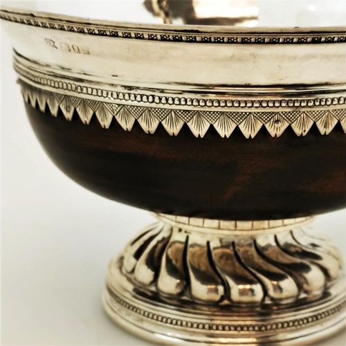 5 - AN EARLY 20TH CENTURY OMAR RAMSDEN MAZER BOWL, with silver mounted on wood, a gentle flaring rim is ... 