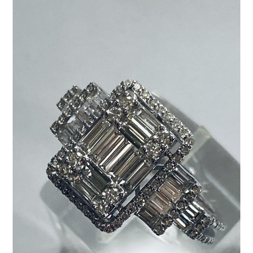 6 - A VERY IMPRESSIVE 18CT WHITE GOLD DIAMOND CLUSTER RING, with an arrangement of baguette and brillian... 