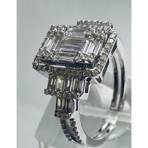 6 - A VERY IMPRESSIVE 18CT WHITE GOLD DIAMOND CLUSTER RING, with an arrangement of baguette and brillian... 