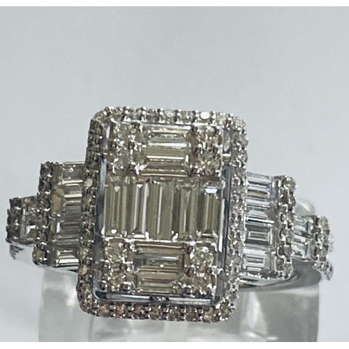 6 - A VERY IMPRESSIVE 18CT WHITE GOLD DIAMOND CLUSTER RING, with an arrangement of baguette and brillian... 