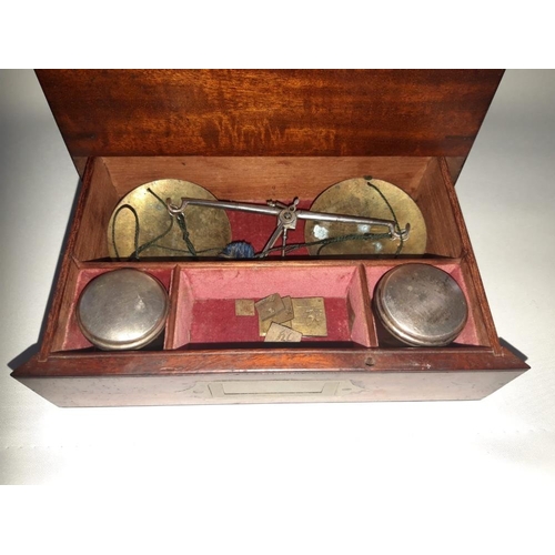 65 - A VERY FINE GEORGIAN MAHOGANY APOTHECARY CHEST, with fitted interior, the hinged top opens to reveal... 