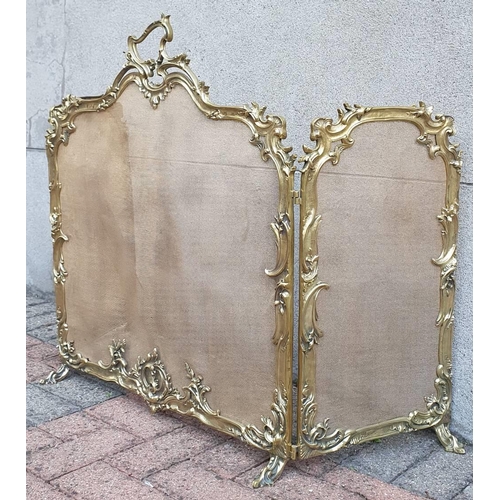 75 - A VERY RARE LARGE SIZED ROCOCCO STYLE POLISHED BRASS 19TH CENTURY FIRE SCREEN, folding, with three s... 