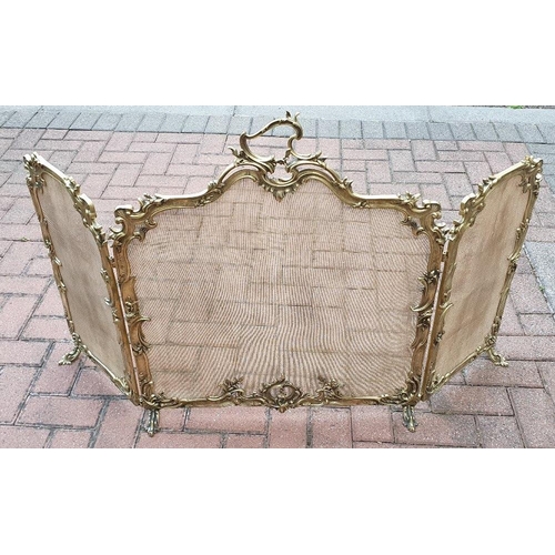 75 - A VERY RARE LARGE SIZED ROCOCCO STYLE POLISHED BRASS 19TH CENTURY FIRE SCREEN, folding, with three s... 