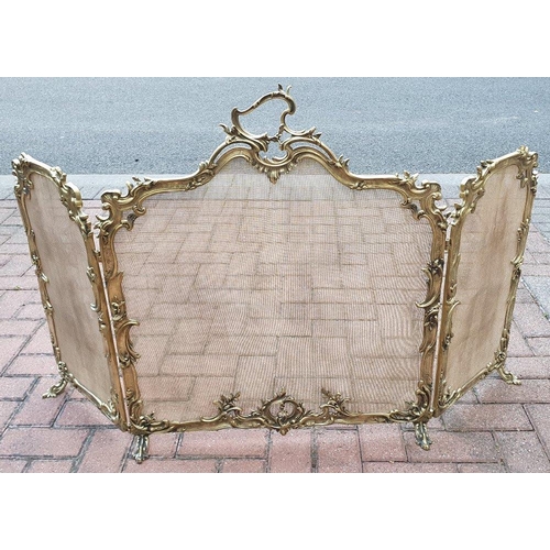 75 - A VERY RARE LARGE SIZED ROCOCCO STYLE POLISHED BRASS 19TH CENTURY FIRE SCREEN, folding, with three s... 