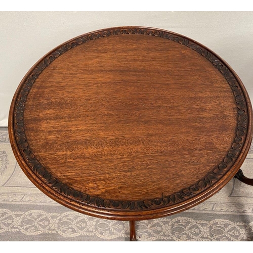 76 - A PAIR OF IRISH MAHOGANY WINE TABLES / LAMP TABES, each with foliage decorated rim, raised on turned... 