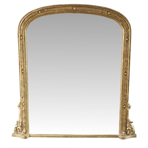 81 - A FINE 19TH CENTURY GILT OVER MANTLE MIRROR, with arched top, decorated with beaded detail and scrol... 