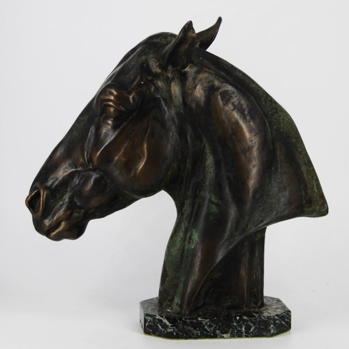 83 - A BRONZE HEAD OF A HORSE, on a green marble stone base, inscribed Albert Hienrich Hussmann to the sc... 