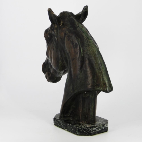 83 - A BRONZE HEAD OF A HORSE, on a green marble stone base, inscribed Albert Hienrich Hussmann to the sc... 