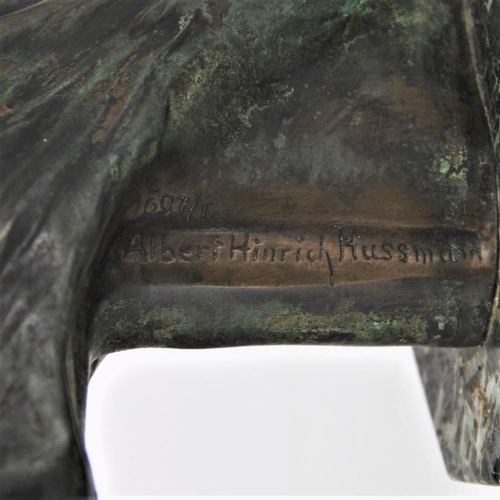 83 - A BRONZE HEAD OF A HORSE, on a green marble stone base, inscribed Albert Hienrich Hussmann to the sc... 