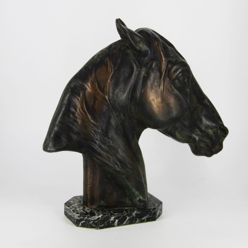 83 - A BRONZE HEAD OF A HORSE, on a green marble stone base, inscribed Albert Hienrich Hussmann to the sc... 