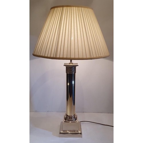 96 - A FINE POLISHED BRASS TABLE LAMP, in excellent condition, with shade, 95.3cm tall x 18.5cm wide x 18... 