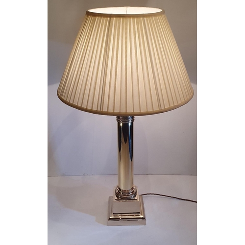 96 - A FINE POLISHED BRASS TABLE LAMP, in excellent condition, with shade, 95.3cm tall x 18.5cm wide x 18... 