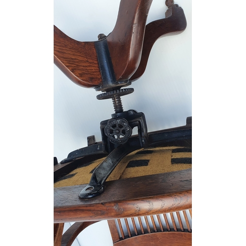 78 - A GOOD QUALITY EDWARDIAN OAK SWIVEL & TILT OFFICE CHAIR, by Ford & Johnson, Chicago.