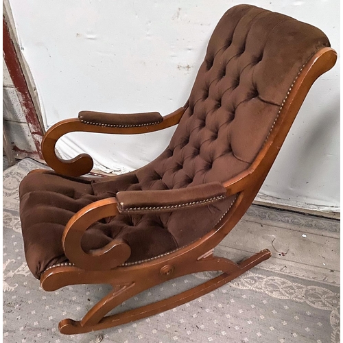 103 - A REGENCY STYLE BUTTON BACK & SEAT ROCKING CHAIR, mahogany framed with scrolling armrest shape, upho... 