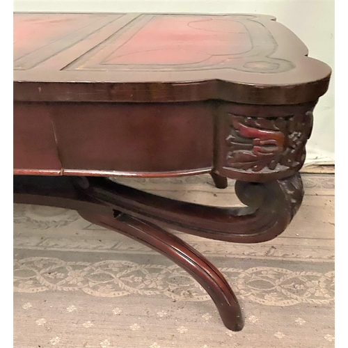 104 - A LOW RISE MAHOGANY LEATHER TOPPED COFFEE TABLE, with a pair of drawers to the front, the leather to... 