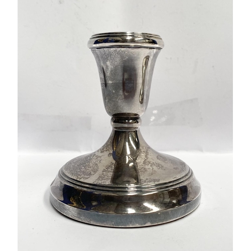 119 - A PAIR OF STERLING SILVER CANDLESTICKS, weighted, with floral decoration to base. Marked ‘Courtship ... 