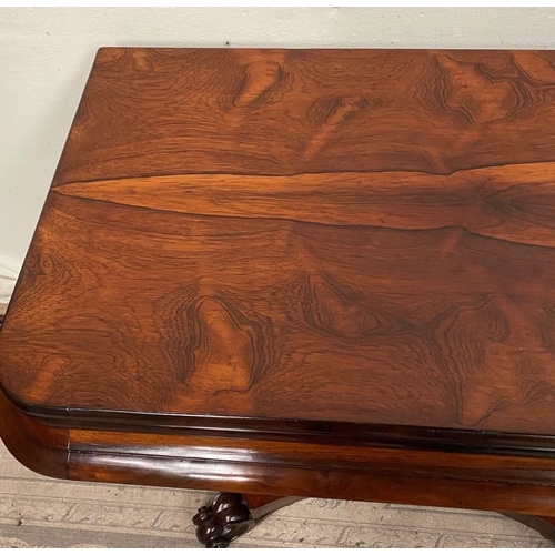 12 - A VERY FINE ROSEWOOD WILLIAM IV FOLD OVER CARD TABLE, with rounded edges to the fold over top, which... 