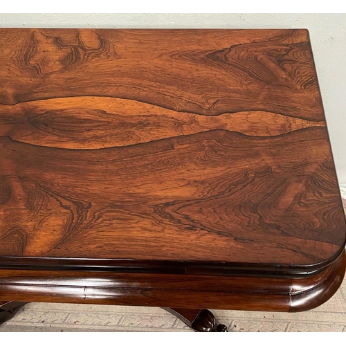 12 - A VERY FINE ROSEWOOD WILLIAM IV FOLD OVER CARD TABLE, with rounded edges to the fold over top, which... 