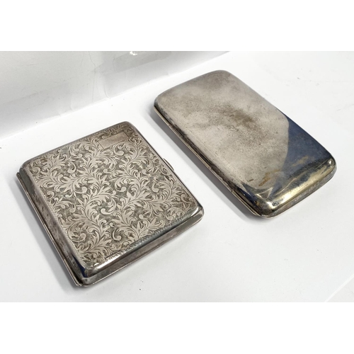 120 - TWO CIGARETTE CASES; (i) A STERLING SILVER ENGRAVED CIGARETTE CASE, floral engraving to front and ba... 