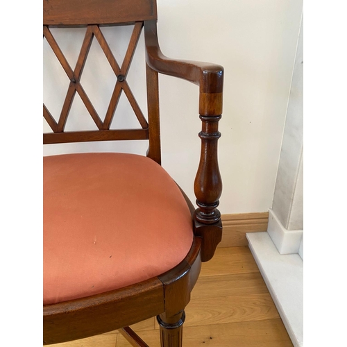 125 - A FINE REGENCY MAHOGANY DESK CHAIR / SIDE CHAIR, with pieced lattice back, the armrests supported wi... 