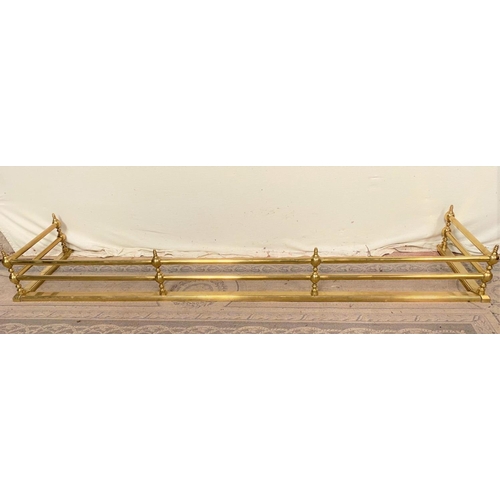 131 - A GOOD QUALITY VICTORIAN BRASS FIRE FENDER, the open rail design makes for a more contemporary desig... 