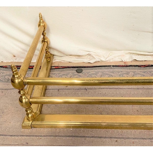 131 - A GOOD QUALITY VICTORIAN BRASS FIRE FENDER, the open rail design makes for a more contemporary desig... 