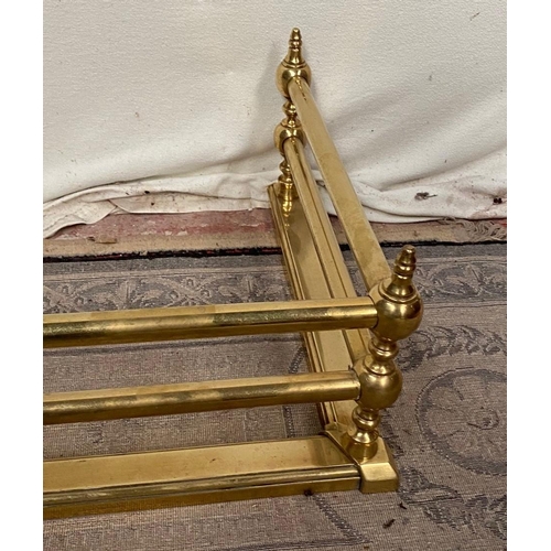 131 - A GOOD QUALITY VICTORIAN BRASS FIRE FENDER, the open rail design makes for a more contemporary desig... 