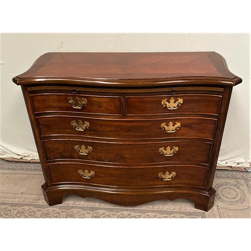 14 - A FINE GEORGIAN STYLE MAHOGANY SERPENTINE SHAPED CHEST OF DRAWERS, with cross-banded top and moulded... 