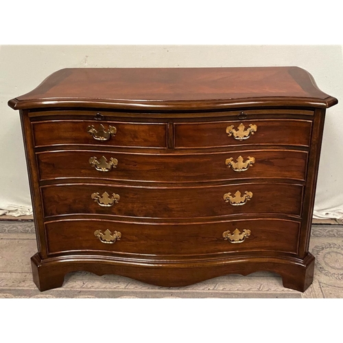 14 - A FINE GEORGIAN STYLE MAHOGANY SERPENTINE SHAPED CHEST OF DRAWERS, with cross-banded top and moulded... 