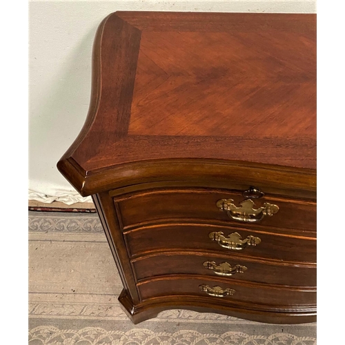 14 - A FINE GEORGIAN STYLE MAHOGANY SERPENTINE SHAPED CHEST OF DRAWERS, with cross-banded top and moulded... 