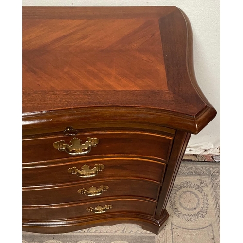 14 - A FINE GEORGIAN STYLE MAHOGANY SERPENTINE SHAPED CHEST OF DRAWERS, with cross-banded top and moulded... 