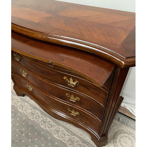 14 - A FINE GEORGIAN STYLE MAHOGANY SERPENTINE SHAPED CHEST OF DRAWERS, with cross-banded top and moulded... 