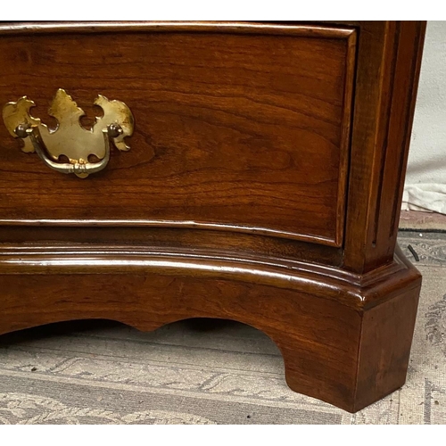 14 - A FINE GEORGIAN STYLE MAHOGANY SERPENTINE SHAPED CHEST OF DRAWERS, with cross-banded top and moulded... 