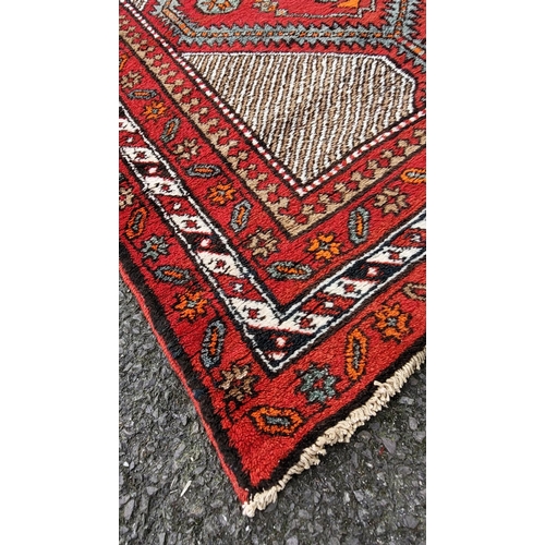 149 - A GOOD QUALITY PERSIAN MESHKIN FLOOR RUNNER, with geometric pattern, with six central medallions sur... 