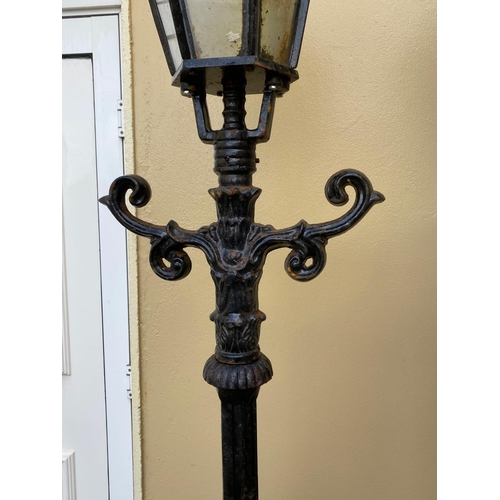 180 - A GOOD PAIR OF CAST IRON GARDEN LAMPS / DRIVEWAY LAMPS, 240cm tall approximately.