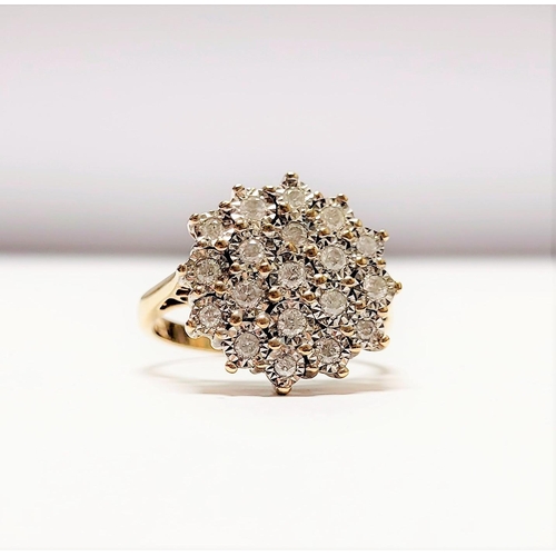 20 - A CHARMING 9CT YELLOW GOLD ILLUSION SET DIAMOND CLUSTER RING, the illusion setting helps to create a... 