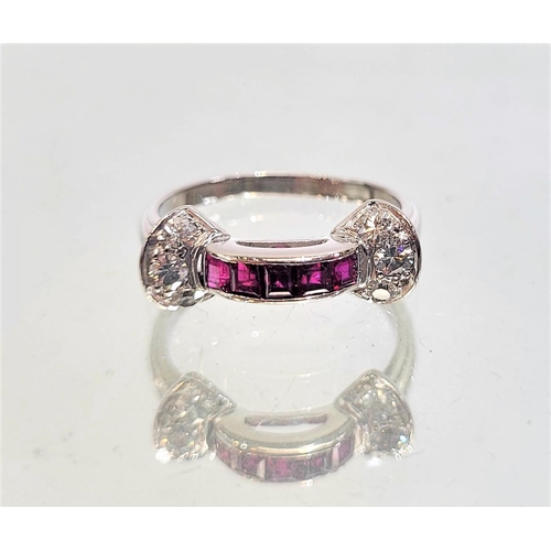 27 - AN ART DECO STYLE RUBY & DIAMOND RING, with platinum band, a row of carre cut channel set rubies to ... 